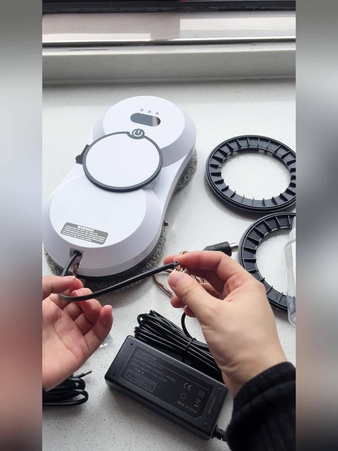 An Intelligent Window-Cleaning Robot That Automatically Sprays Water, Remote-Controlled Electrically Operated Glass Cleaning Robot with Planning Function