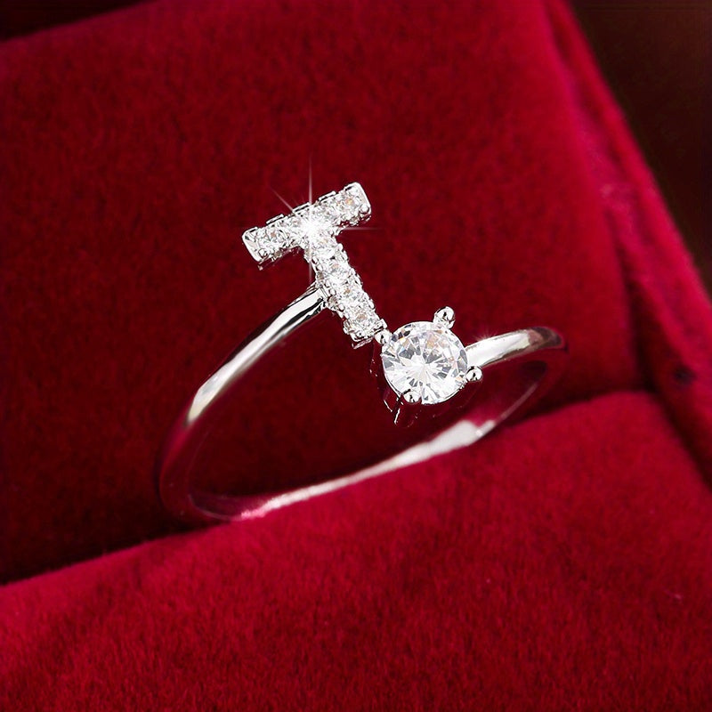 Adjustable Copper Ring With Four-claw Round Zirconia, Featuring The 26 English Letters Of Fashion Trend.