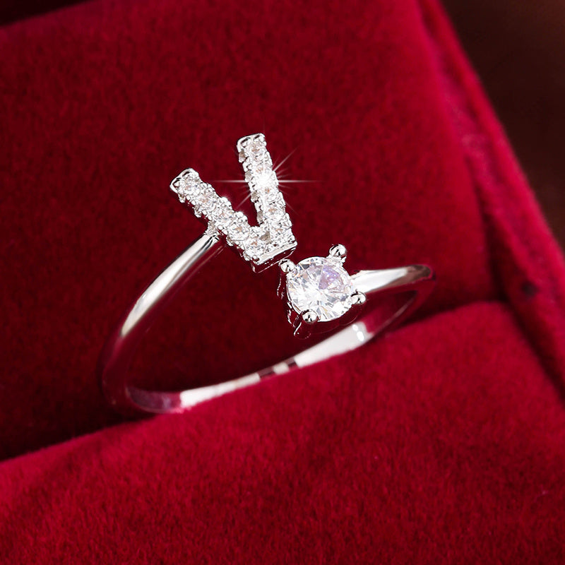 Adjustable Copper Ring With Four-claw Round Zirconia, Featuring The 26 English Letters Of Fashion Trend.