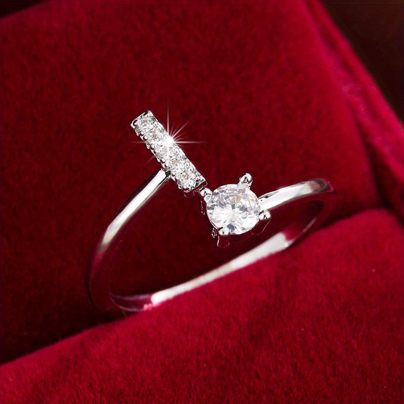 Adjustable Copper Ring With Four-claw Round Zirconia, Featuring The 26 English Letters Of Fashion Trend.