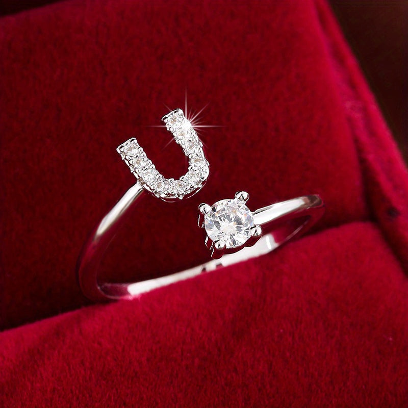 Adjustable Copper Ring With Four-claw Round Zirconia, Featuring The 26 English Letters Of Fashion Trend.