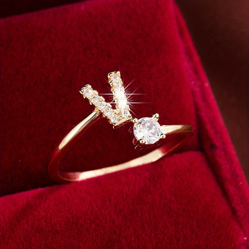 Adjustable Copper Ring With Four-claw Round Zirconia, Featuring The 26 English Letters Of Fashion Trend.