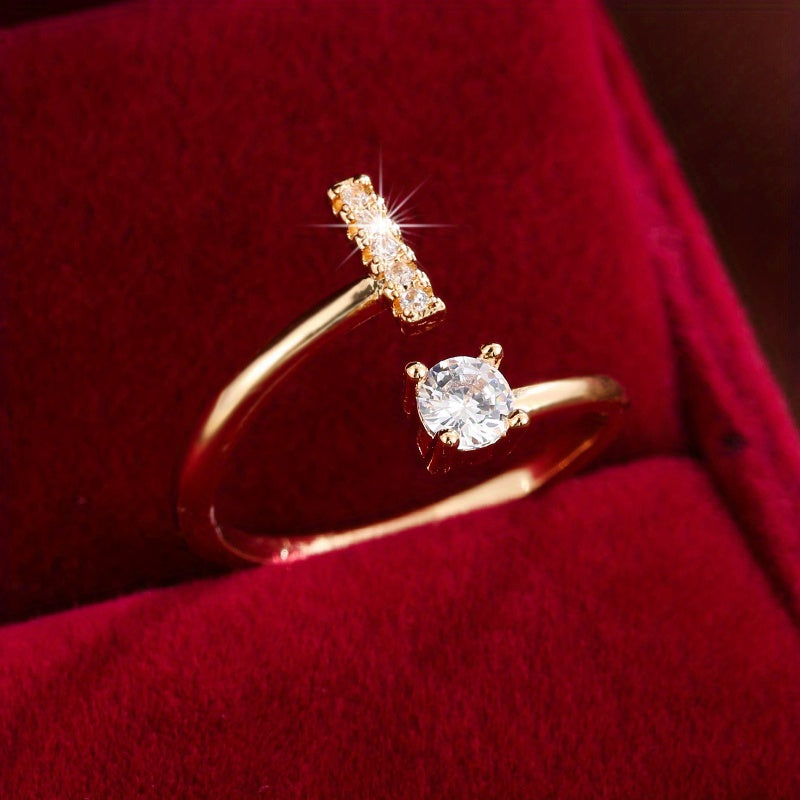 Adjustable Copper Ring With Four-claw Round Zirconia, Featuring The 26 English Letters Of Fashion Trend.