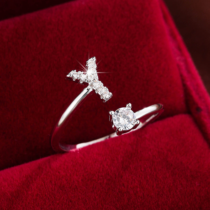 Adjustable Copper Ring With Four-claw Round Zirconia, Featuring The 26 English Letters Of Fashion Trend.